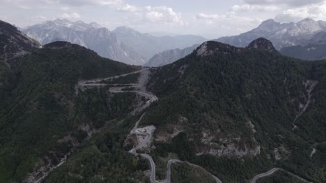 Drone-video-of-"front"-plane,-advancing-on-the-Sh21-over-the-top-of-the-Theth-mountain-pass