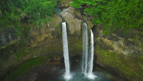 Aerial-Drone-Wide-Shot-Slow-Crane-down-of-Waterfall-revealing-Pool-below