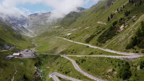Aerial-Drone-View-of-the-famous-Stelvio-Mountain-Pass-in-Italy---Cycling-Road-of-the-Giro-d'-Italia