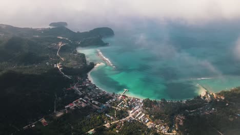 Beautiful-green-blue-sea-with-white-sand-beaches-in-the-Chaloklum-Bay-seen-through-the-white-clouds-on-a-sunny-day-on-the-island-of-Koh-Phangan