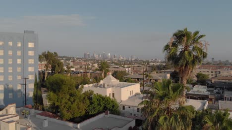 Drone-view-of-Downtown-Los-Angeles-from-the-Los-Feliz,-Hollywood,-Griffith-Park-Observatory-area-in-late-afternoon