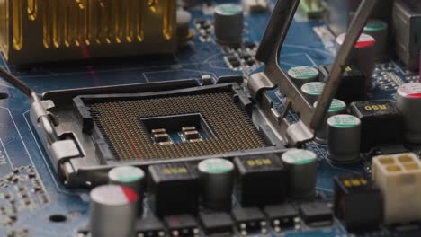 CPU-Processor-Socket-being-scanned-by-red-laser,-Motherboard-with-Electronic-components,-Close-up