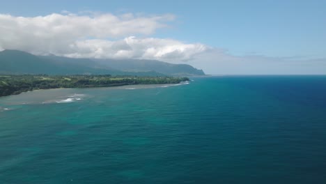 Wide-Aerial-Shot-Tracking-right-of-Anini-Beach,-Kauai,-Hawaii