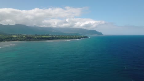 Extreme-Wide-Aerial-Dolly-moving-slowly-forward-high-towards-Anini-Beach,-Kauai,-Hawaii