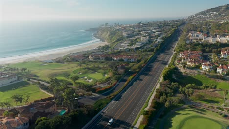 Aerial-view-over-the-Pacific-coast-highway-with-a-view-of-the-Pacific-Ocean-and-Monarch-beach-Golf-Course