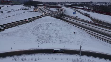 Snowy-Autobahn-interchange,-A40-Bochum,-Wide-angle-view,-dusk