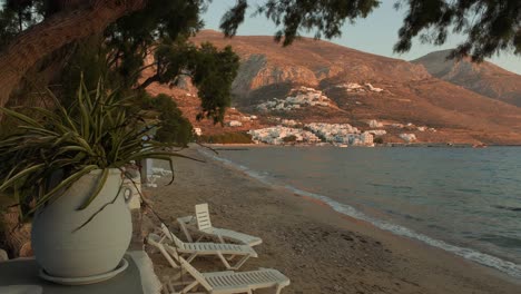 Wide-shot-of-the-pretty-little-village-of-Egliali-at-sunset-on-the-island-of-Amorgos-in-the-Greek-Cyclades-Islands,-Europe