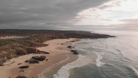 Remote-golden-sand-beach-on-Atlantic-coastline,-Portugal