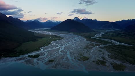 Amazing-river-delta-running-down-from-snow-capped-mountains-in-Glenorchy,-New-Zealand
