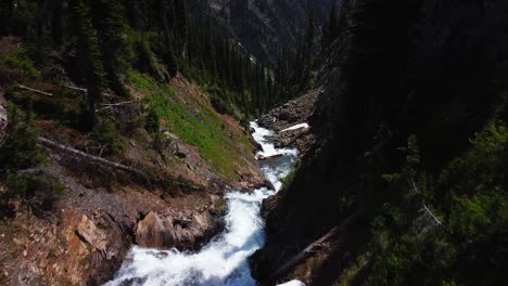 Alpine-creek-flowing-through-canyon,-aerial-shot,-West-Kootenays,-aerial-shot