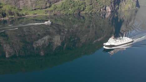 The-ferry-sails-slowly-through-a-quiet-Norwegian-fjord
