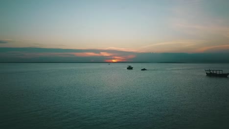 Unbelievable-aerial-flight-slowly-rise-up-high-drone-shot-at-nice-sunset-over-coast-line-boats-in-paradise-dream-beach-Zanzibar,-Africa-Tanzania-2019-Cinematic-wild-nature-1080,-60p-by-Philipp-Marnitz