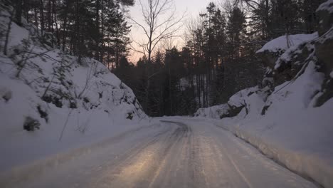 Driving-Car-On-Winter-Mountain-Road-At-Sunset---POV