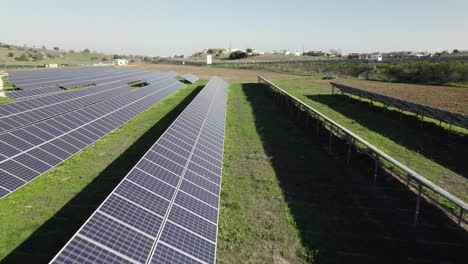 Drone-flying-over-panel-installed-for-solar-energy-at-Lagos-in-Portugal