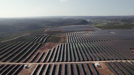 High-panorama-view-endless-Solar-farm,-rows-of-solar-panels-collecting-sun,-Portugal