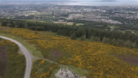Drone-shot-revealing-Dublin-City-from-the-mountains