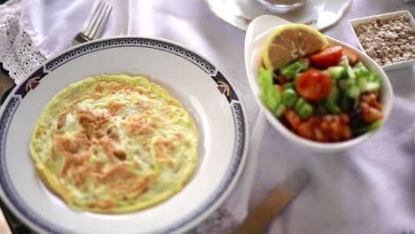 Thick-fluffy-omelette-with-green-fruits-salad-hotel-food
