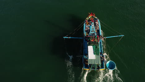 Local-Vietnamese-fishing-vessel-returns-from-fishing-grounds,-aerial