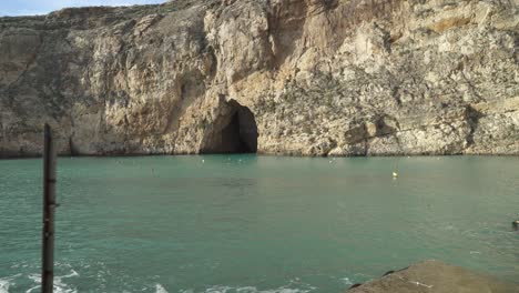 Sign-of-Slippery-Surface-Placed-near-Inland-Sea-Caves-in-Gozo-Island