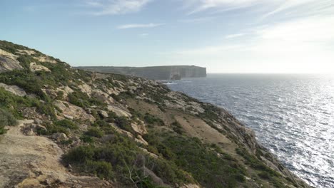 Steep-Hills-with-Greenery-near-Coastline-of-Mediterranean-Sea-in-Gozo-Island