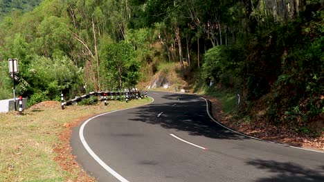 isolated-mountain-curvy-tarmac-road-with-green-forests
