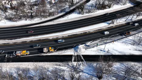 An-aerial-view-of-a-highway-after-a-heavy-snowfall