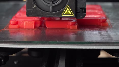 An-extruder-of-a-3D-printer-jumping-to-different-pieces