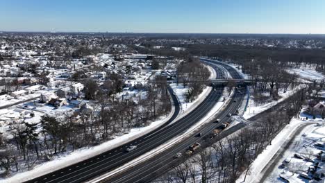 A-high-angle-view-of-a-highway-after-a-heavy-snowfall