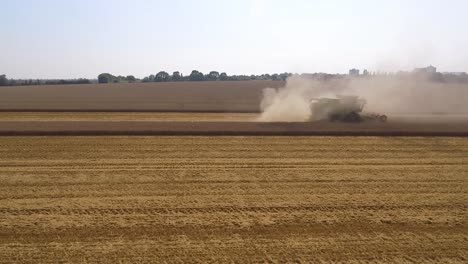 Harvest-drone-tracking-Claas-Combine-Harvester-slowly-from-side