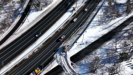 An-top-down-view-of-a-highway-after-a-heavy-snowfall