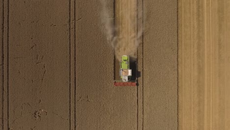 Harvest-Topdown-shot-of-Claas-Combine-Harvester-from-rising-drone