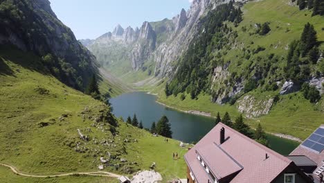 Guesthouse-Bollenwees-and-Falensee-Mountain-Lake,-Appenzell,-Switzerland---Aerial-Drone-View-of-the-Swiss-Alps,-Popular-Hiking-Tral