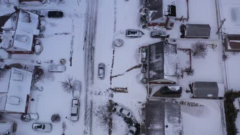 An-aerial-view-of-a-quiet,-suburban-neighborhood-after-a-nor'easter-storm