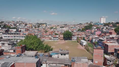 Aerial-landscape-image---Flying-over-slum-in-district-of-Capão-Redondo,-São-Paulo-City-in-Brazil