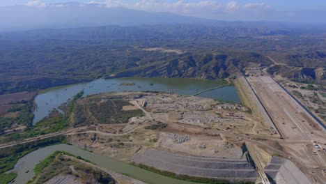 Aerial-view-around-the-Monte-Grande-dam-construction-area,-in-Dominican-republic---orbit,-drone-shot