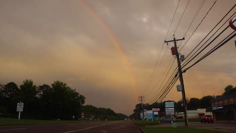 Rainbow-over-looking-a-Ritchie-highway-in-Severna-Park,-Maryland