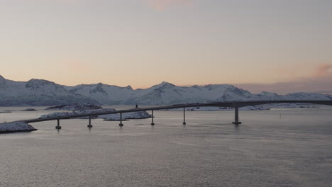 Bridge-To-The-Sommaroy-Island,-Tromso,-Norway,-Scandinavia-During-Winter---aerial-drone-shot