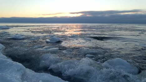 Waves-crashing-on-the-shores-of-Lake-Superior-icebergs-formations-floting-on-the-water-winter-morning