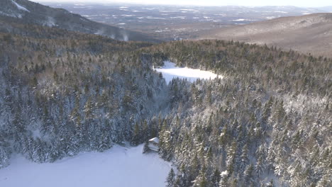 Majestic-Mountain-Scenery-In-Winter-In-Quebec,-Canada---aerial-shot
