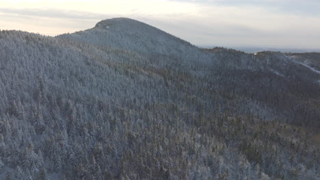 Flyover-Winter-Scenery-In-The-Mountain-And-Forest---aerial-shot