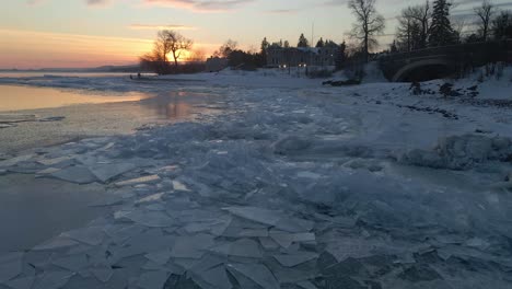 Ice-formations-at-the-shores-of-Lake-Superior,-winter-sunset