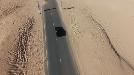 Slow-Motion-FPV-Drone-Clip-of-Off-Road-Car-in-the-desert