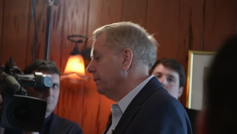Presidential-Candidate-Senator-Lindsey-Graham-Talks-To-Supporters-At-A-Political-Campaign-Stop-Before-The-Iowa-Caucus