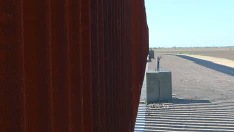 Pan-up-view-of-the-wall-at-the-USA---Mexico-border