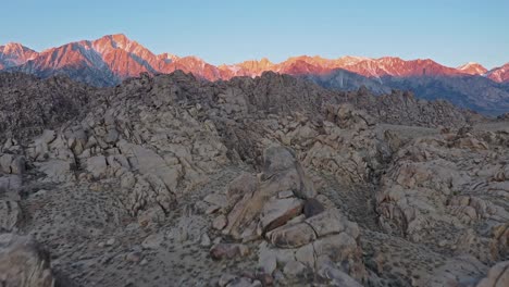 Excellent-Aerial-Shot-Of-The-Sunrise-Hitting-Snow-Capped-Mount-Whitney-In-California'S-Alabama-Hills
