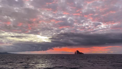 The-Sun-Sets-Over-The-Leon-Dormido-Rocky-Formation-In-The-Galapagos