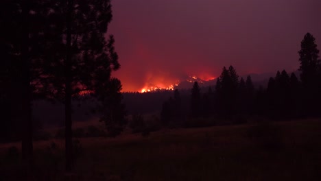 The-Dixie-Fire-Burns-Unchecked-In-The-Distance-In-Northern-California-At-Night