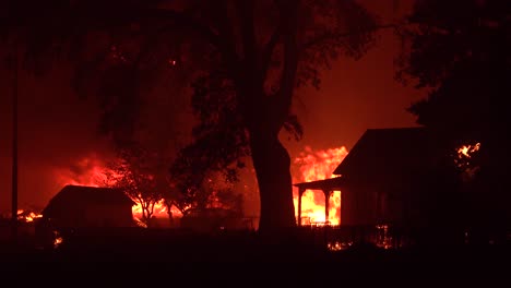 A-House-Is-Engulfed-In-Flames-At-Night-During-The-Disastrous-Dixie-Fire-In-Northern-California