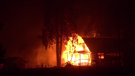 A-House-Is-Engulfed-In-Flames-At-Night-During-The-Disastrous-Dixie-Fire-In-Northern-California
