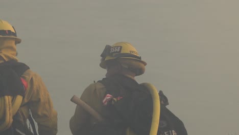 Firefighters-Use-A-Hose-And-Water-Against-The-Flames-Of-The-Alisal-Fire-Burning-Along-The-Gaviota-Coast-In-Santa-Barbara-County
